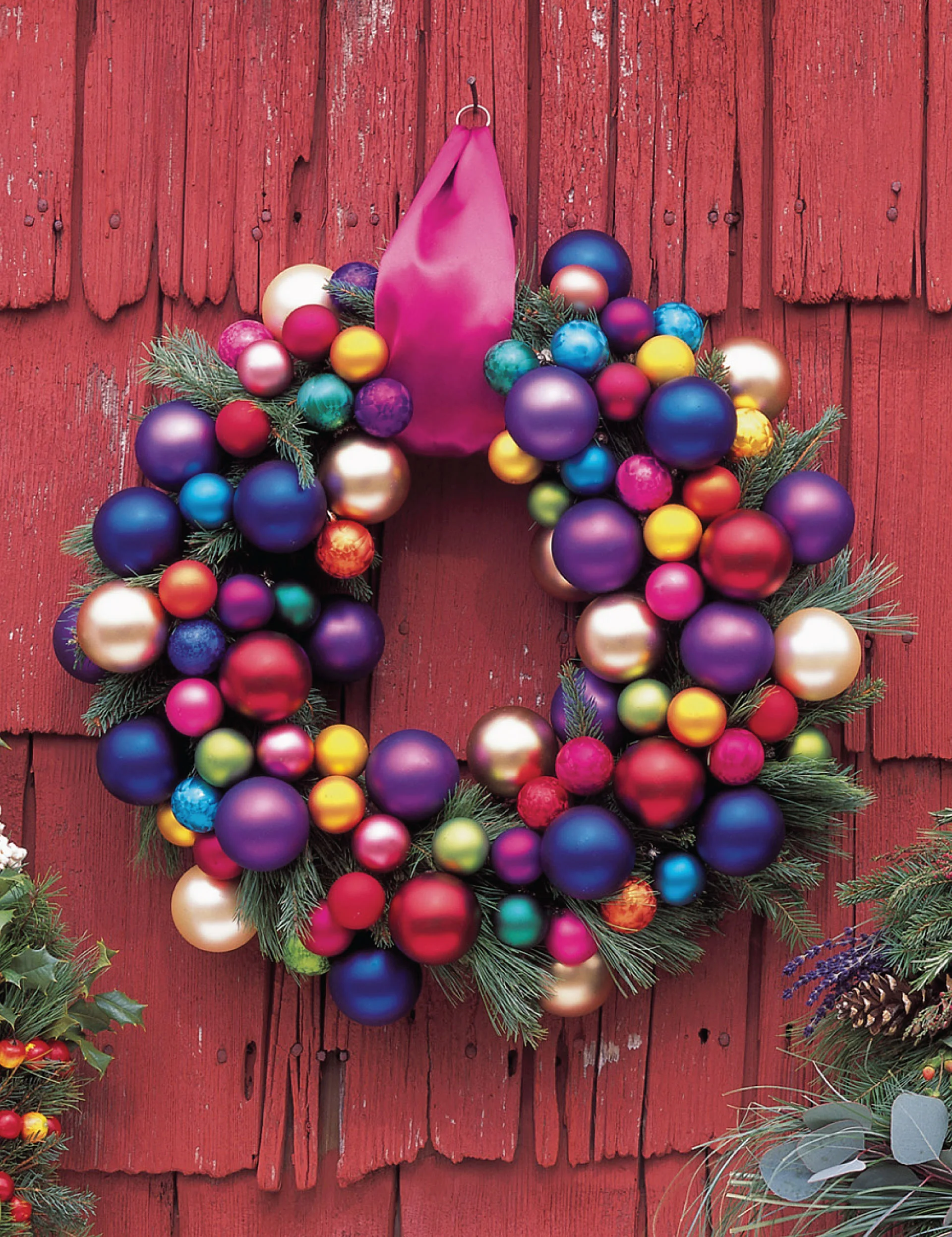 Good Housekeeping presented this colorful wreath recently. I like the sprigs of greenery.