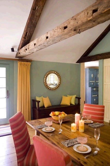 The old beams were added to this addition to make it appear like an old barn. Very effective!