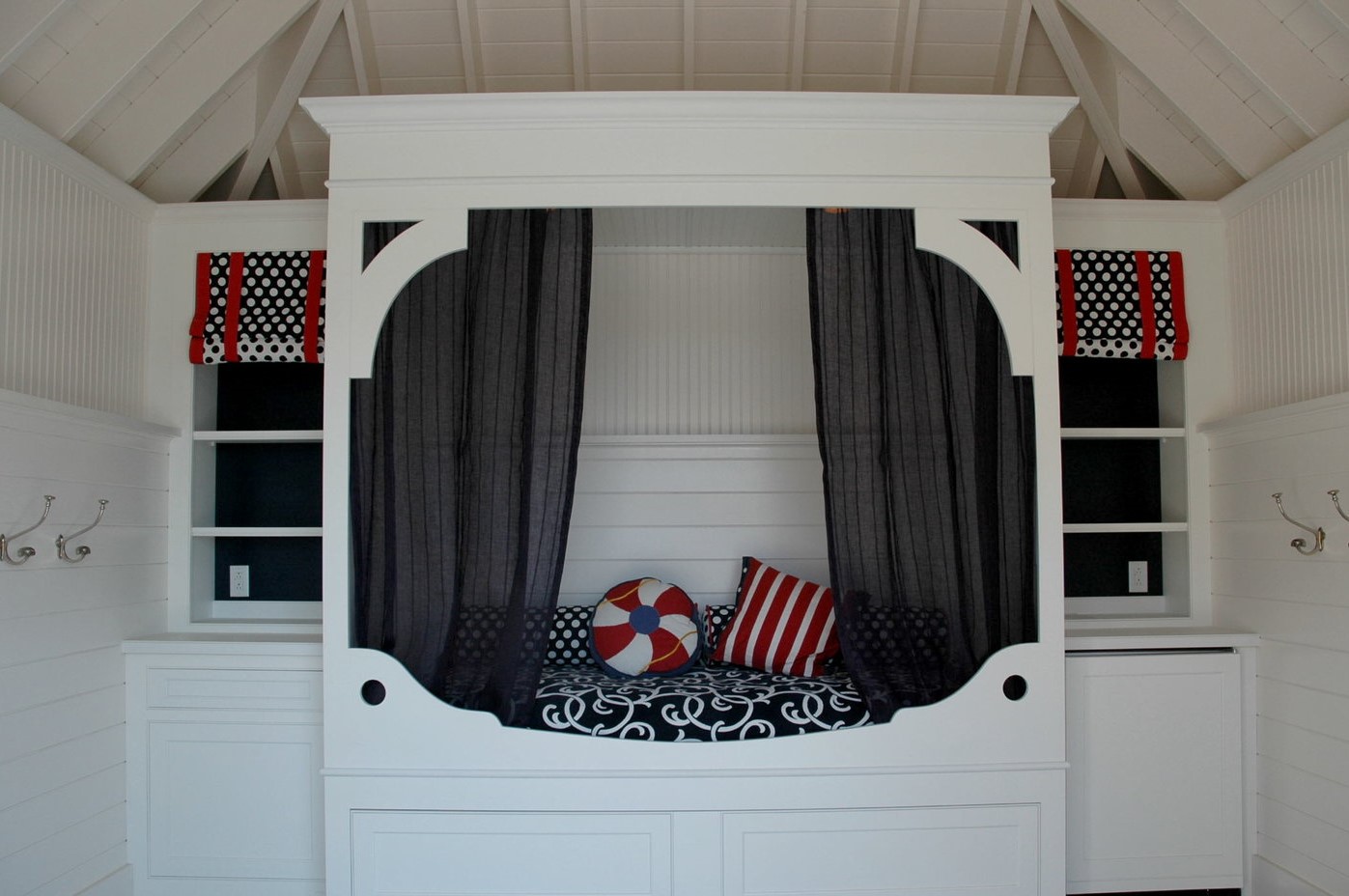 This was such a fun project to work on. This pool cabana is made of all natural elements: wood and stone. The ceiling is painted structural components. 