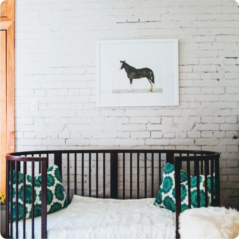 The Wall Sticker Company has produced a removable paper that looks like an old brick wall. Pretty believealbe! 