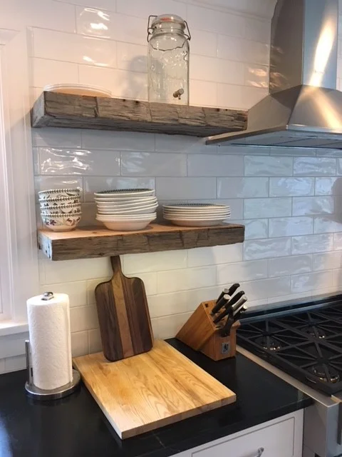 If you can handle open shelves, make sure they are securely installed. Our builder installed steel posts in the wall that the shelves slide onto. They can carry the weight of almost anything!
