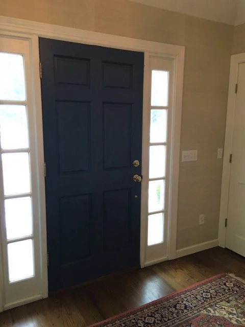 We picked Benjamin Moore’s Bold Blue (a color found in the rug) for the inside of the door. It’s a nice contrast to the grass cloth on the walls.