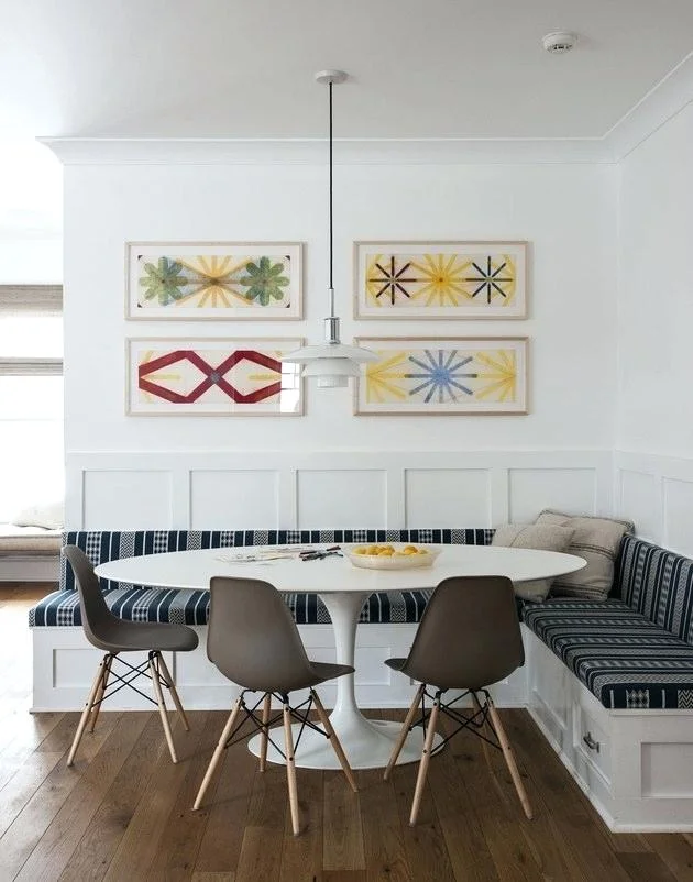 A similar white bench with easy storage underneath the seats is paired with a white contemporary breakfast table and three chairs. Thank you theathleticperformance.info for another example!