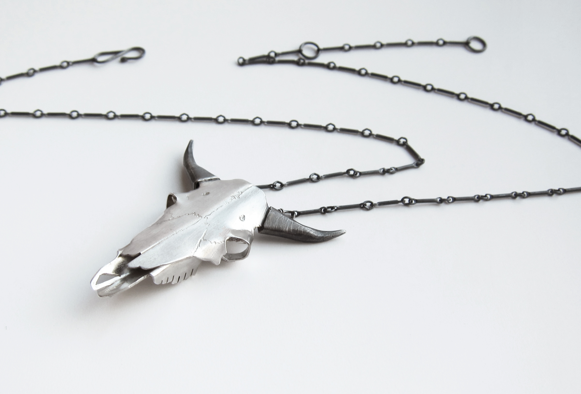 Large buffalo skull necklace