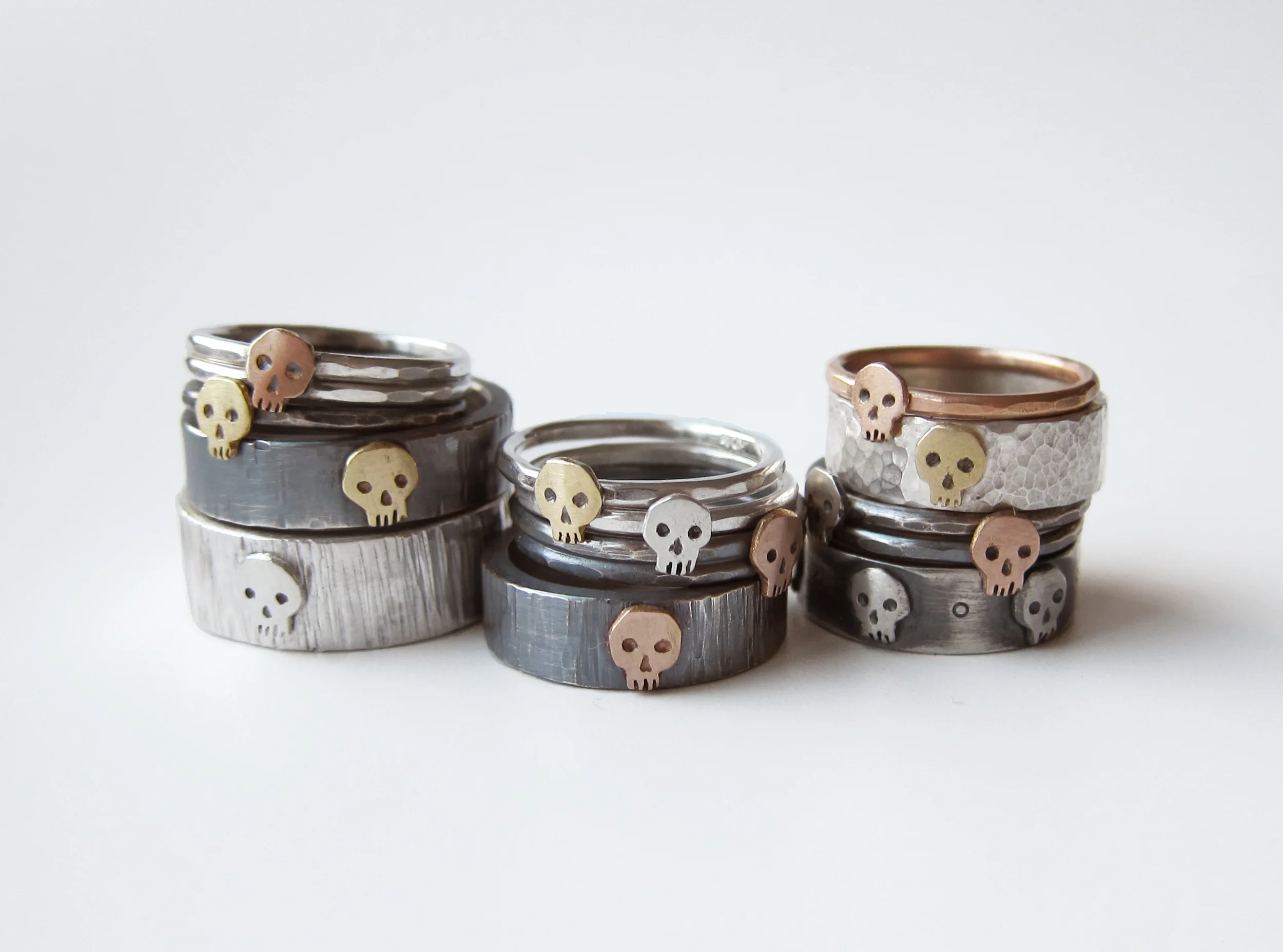 Mixed metals skull rings