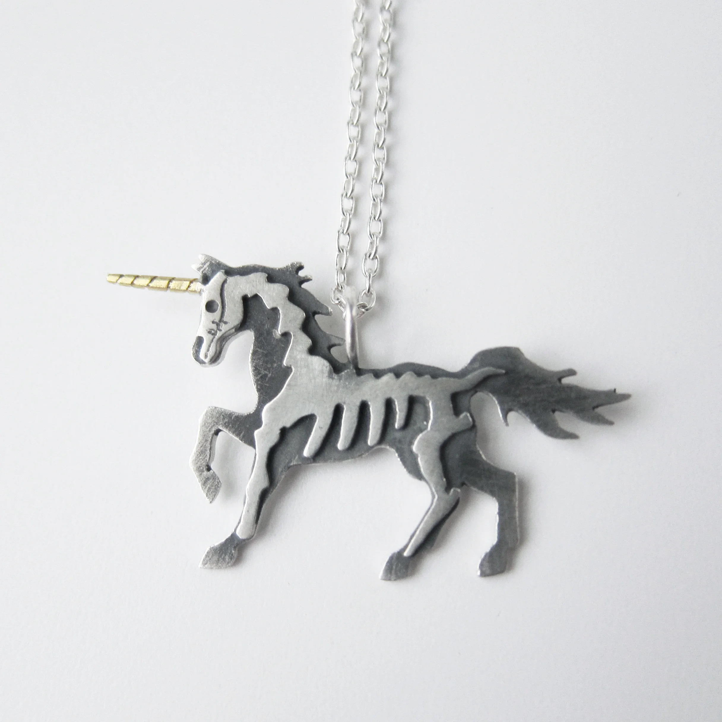 4. reversible unicorn, sterling with 18ky, back close up.jpg