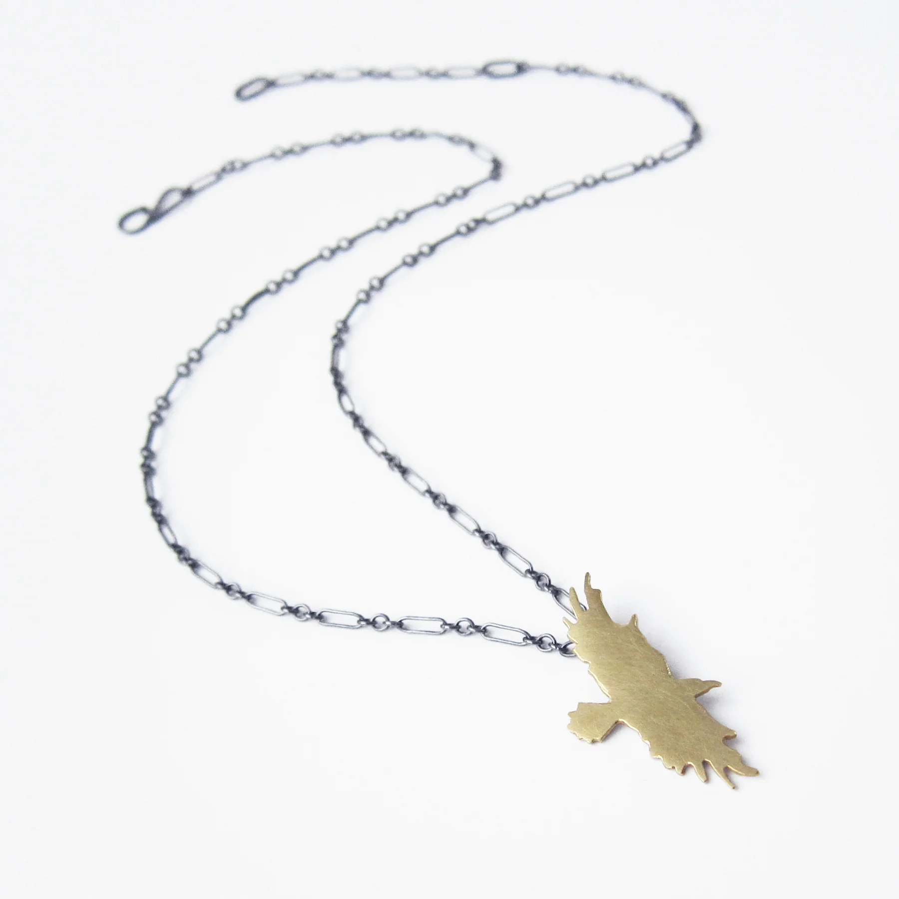 single flying raven, 18k gold and ox ster, whole piece.jpg