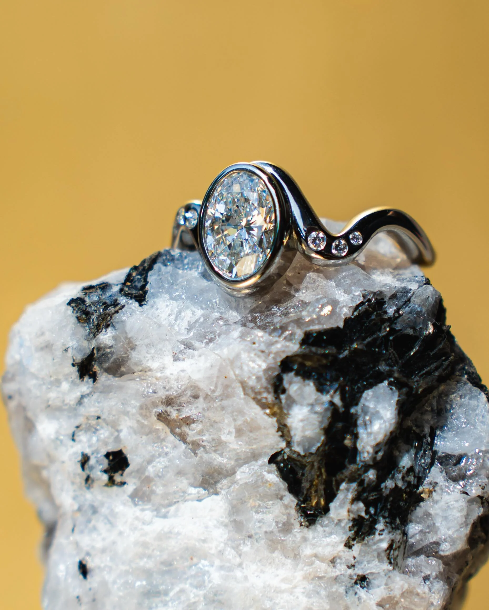 Congrats to J &amp; M 🎉🥂❣️
We took the water wave inspo from this ring design seriously for capturing this ring. 
🌊🌊🌊🌊🌊🌊
.
.
.
📸: @pattyframes 
#customengagementring #engagementring #ovaldiamond #cincinnatismallbusiness #whitegold