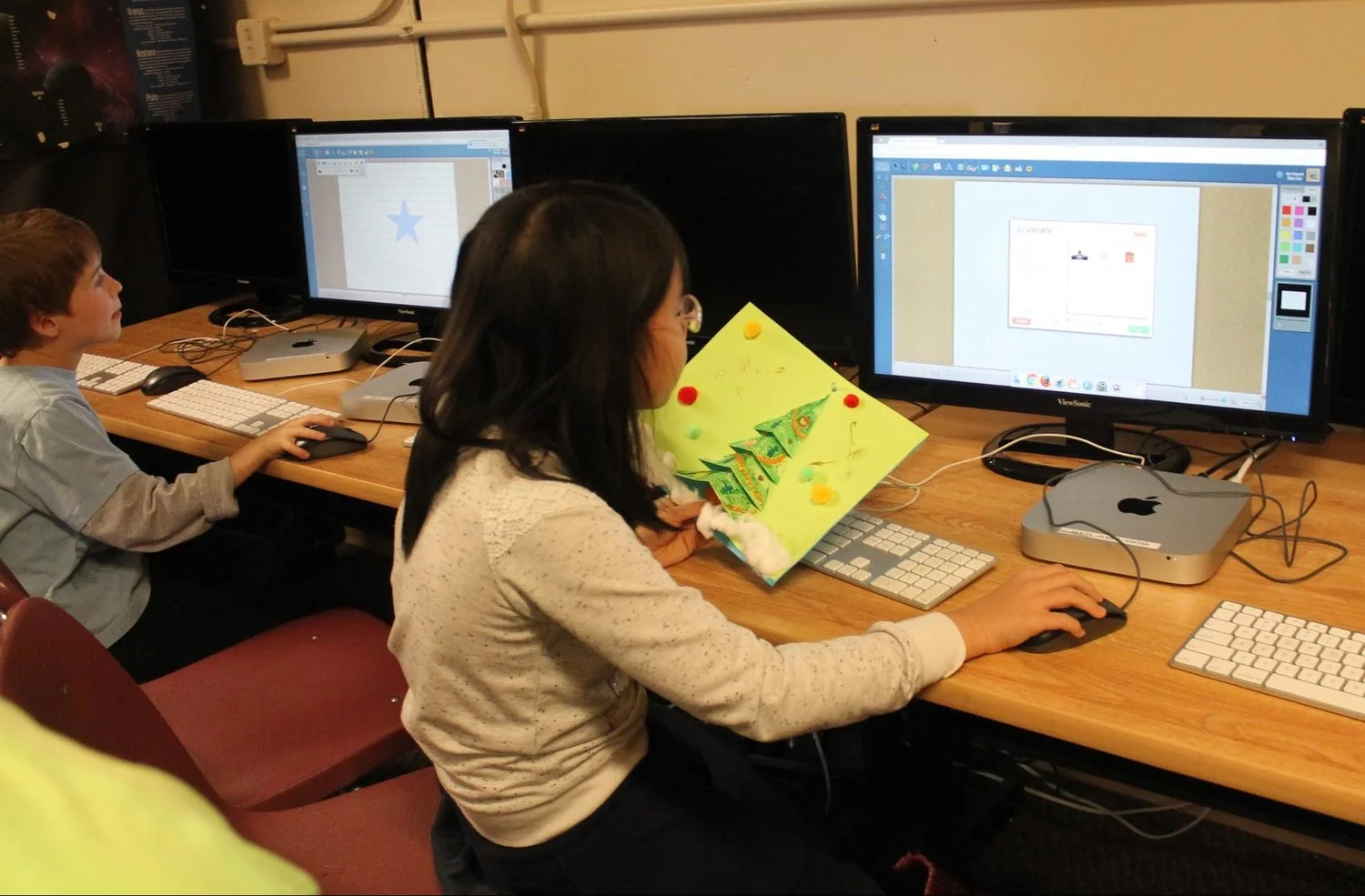 CU Girl Designing Christmas Tree copy.jpg