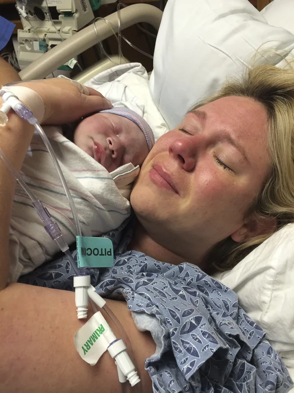 Holding Oliver for the first time.