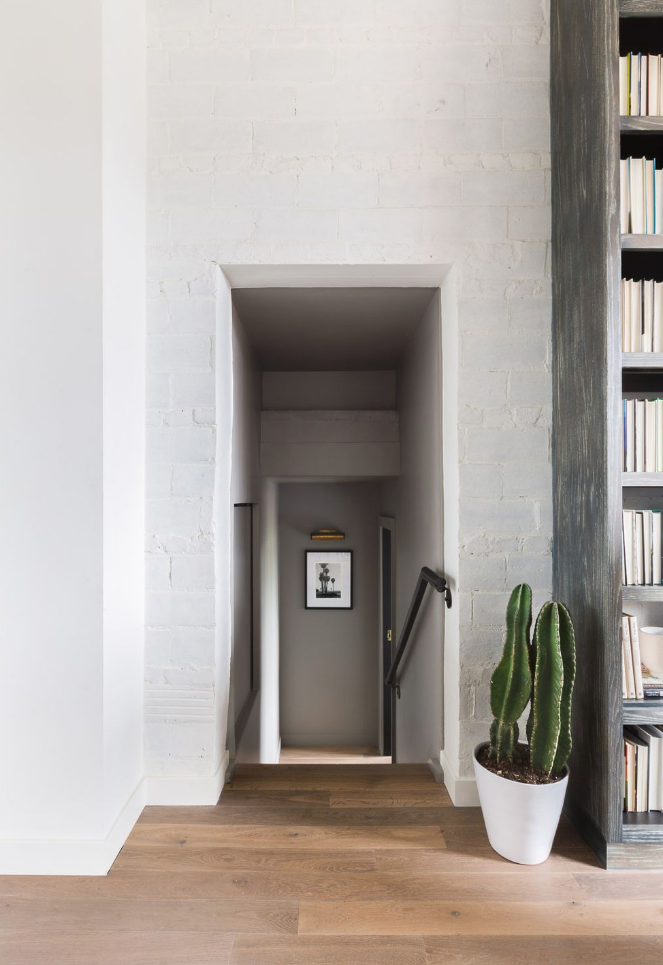 c/o Elle Decor - Photo by Alyssa Rosenheck&nbsp;-&nbsp;Light via 360 Volt&nbsp;- art by Stephanie Pfriender Stylander