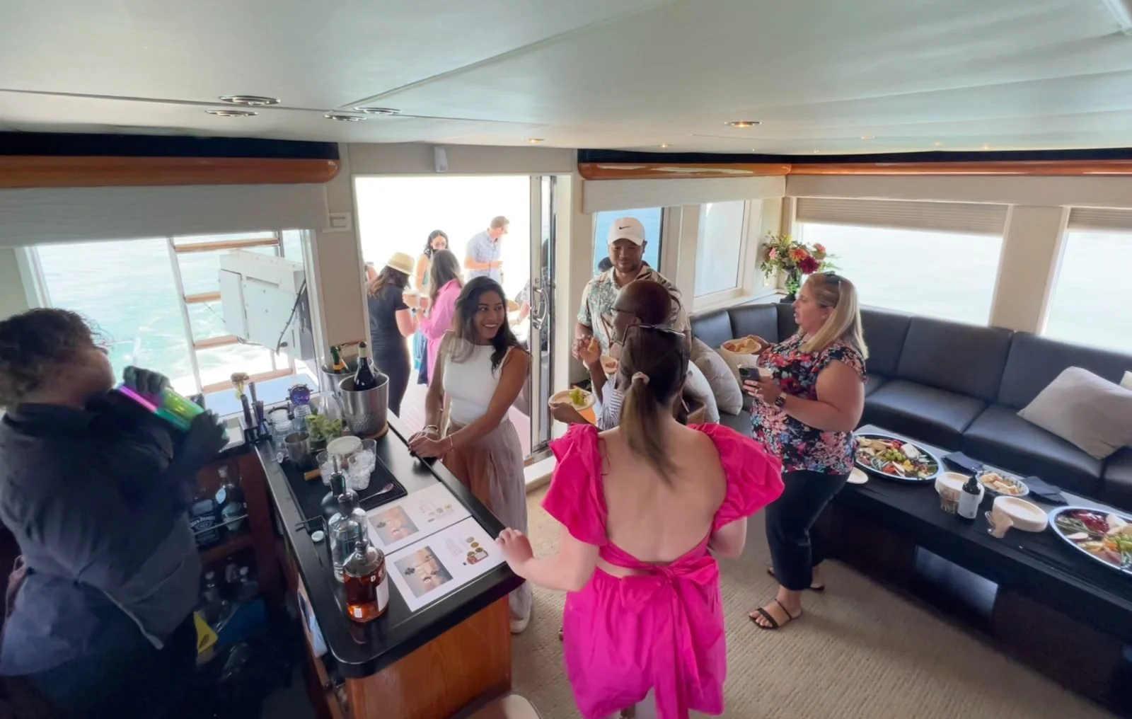Group enjoying a catered party aboard a yacht