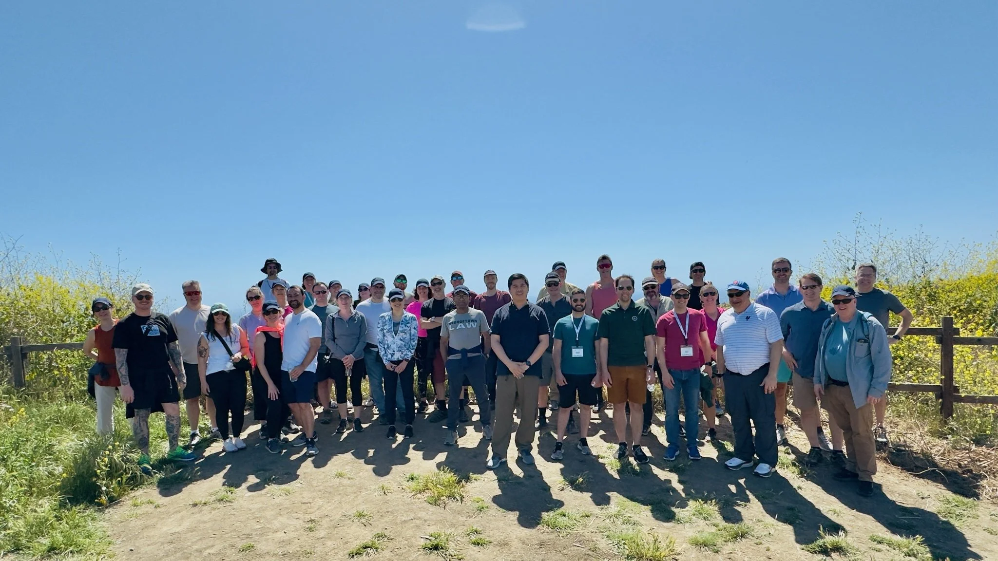 Large corporate team photo on the Top of the World trail in Laguna Beach