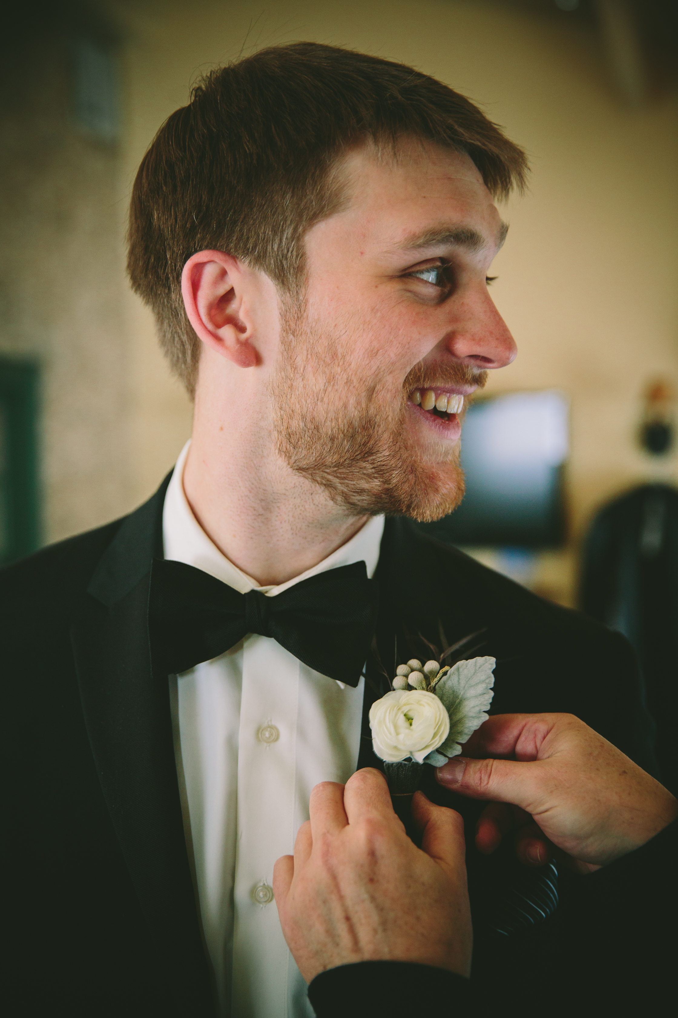  Boutonnières&nbsp;were also wrapped in vintage sweaters and leather cord. 