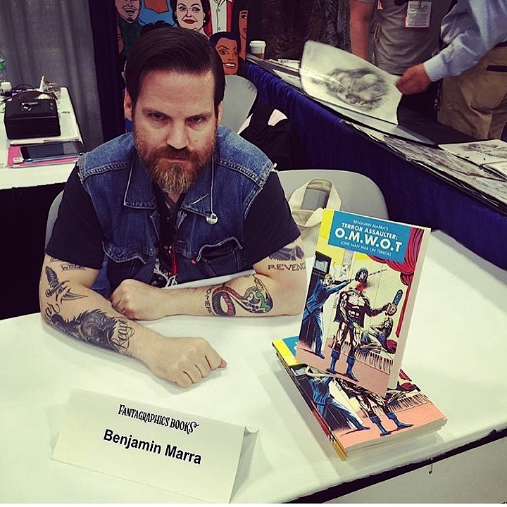 We got to hang out with this monkey-fucker all weekend. This is artist, writer, poet barbarian and HUMANS pin-up artist, Benjamin Marra. He was at SDCC signing his killer new book, OMWOT (One Man War On Terror) out soon from Fantagraphics! If you haven't looked into his work, stop fuckin' around and get to it!