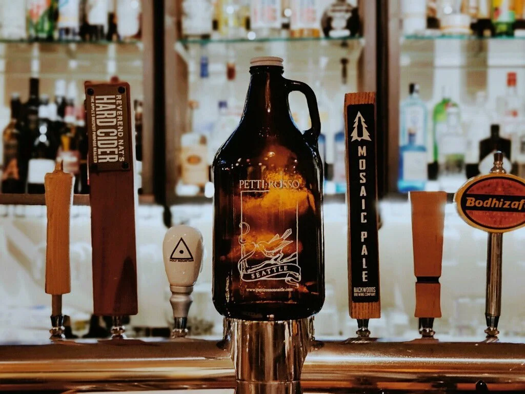 Staying in on NYE?  Come get a growler of your favorite tap at @cafepettirosso!