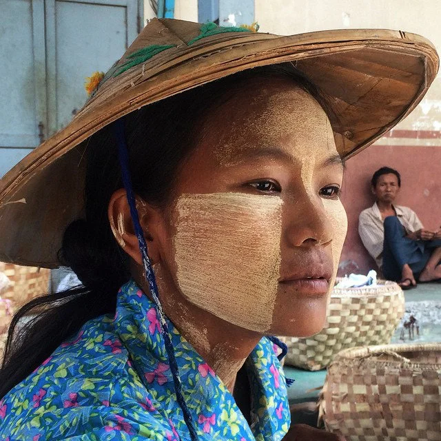 Working in the scorching Mandalay market, Khin Mar Win wears thick Thanaka stripes along with a bamboo hat to protect her from temperatures that regularly soar above 40ºC (104ºF). 