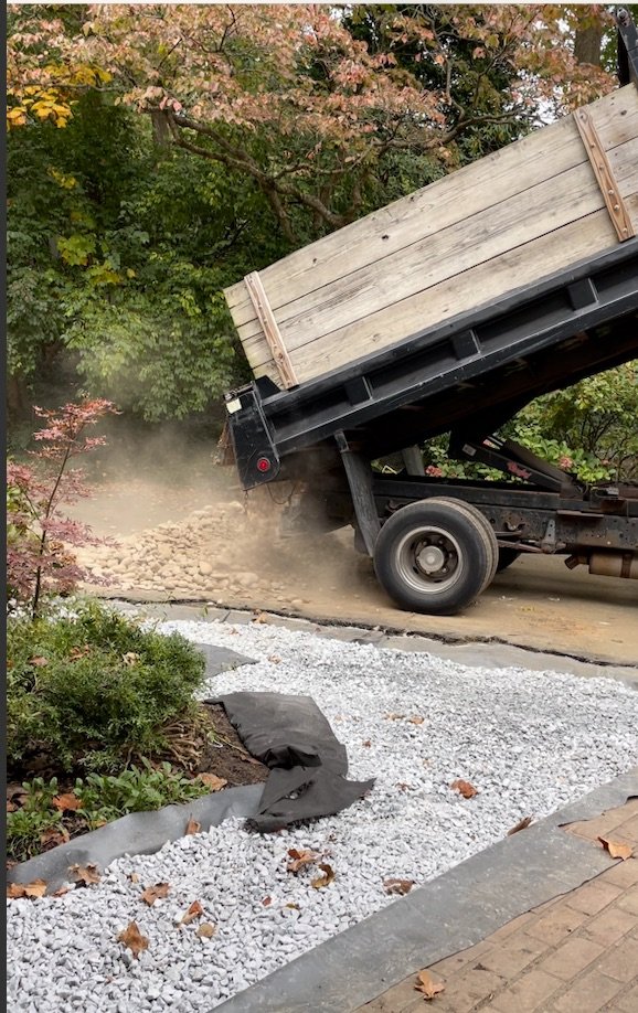 truck dumping rocks.jpg