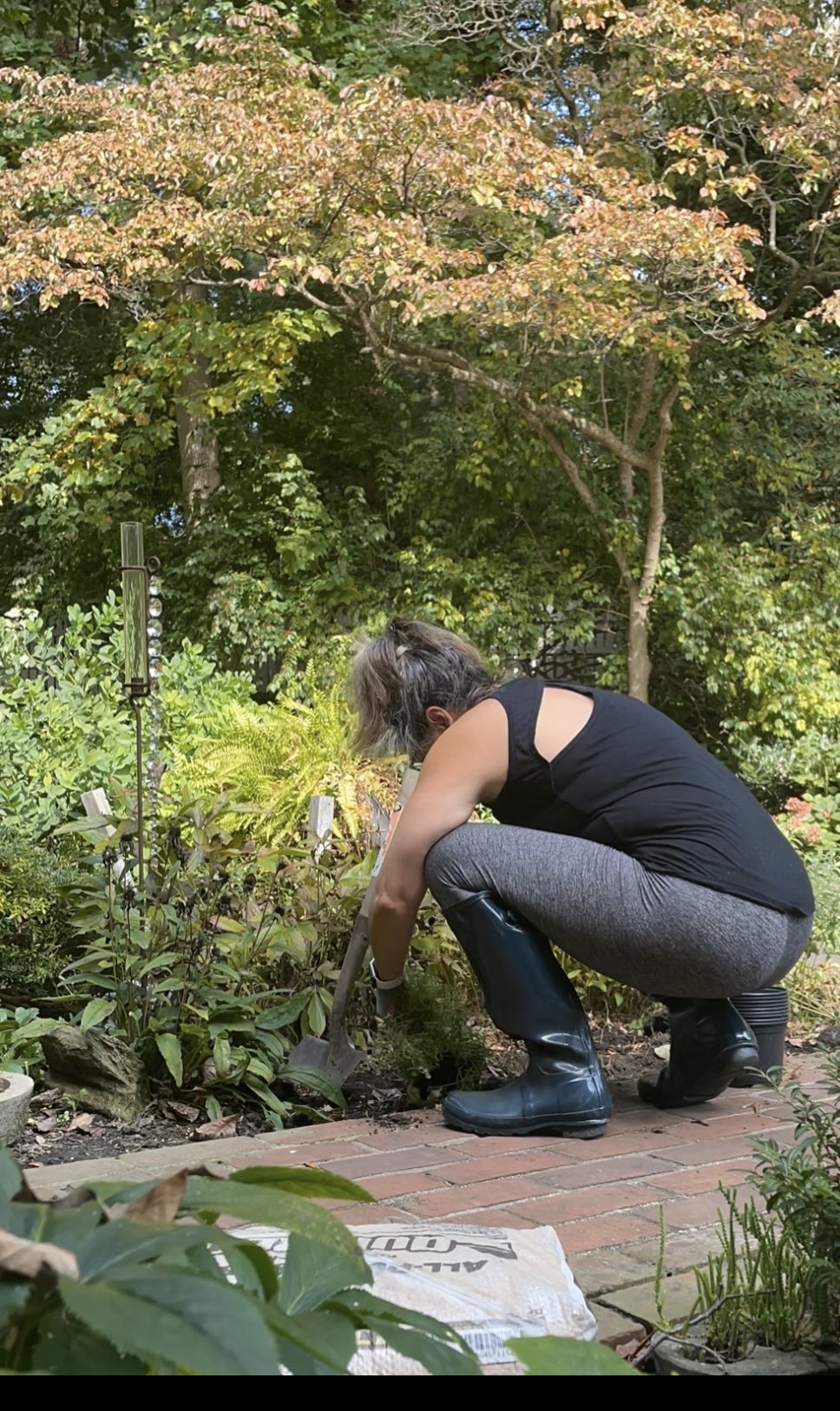 allison digging out garden.jpg