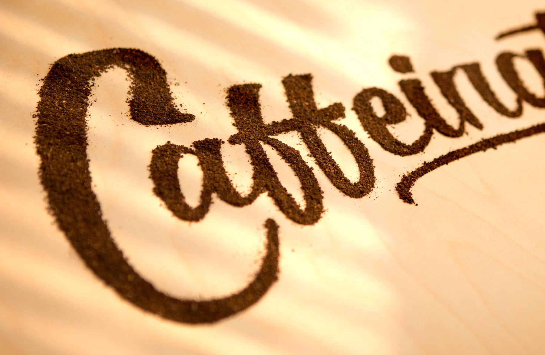 "... I printed the logo, cut it nicely on a laser cutter, filled the masked piece with fine coffee and created the best smelling logo of all times!"