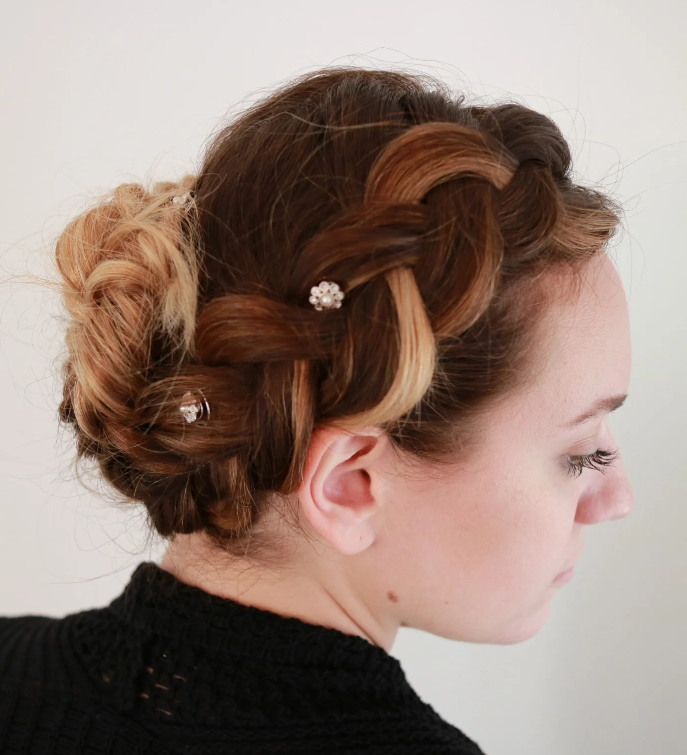 Dress this dutch braid up or down for a company holiday party or hanging at home decorating the Christmas tree | Styled by Emily