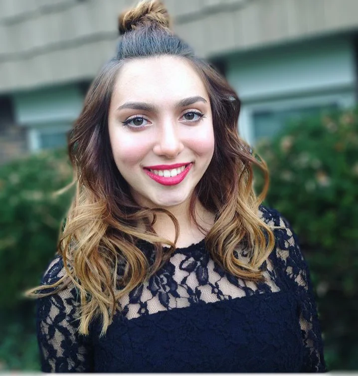 The fishtail topknot is one of our favorite holiday party hairstyles | Styled by Sheri