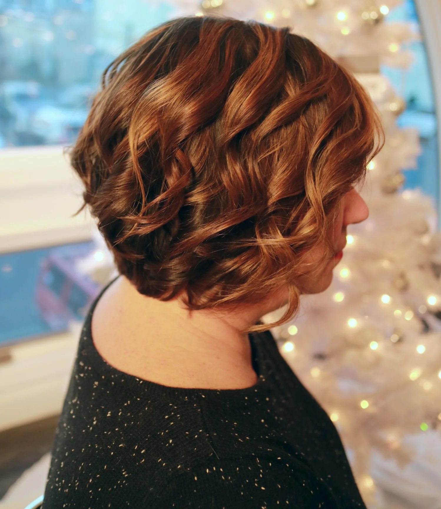 These Christmas curls are glistening with Kevin.Murphy Shine.Spray | Styled by Baby Kate