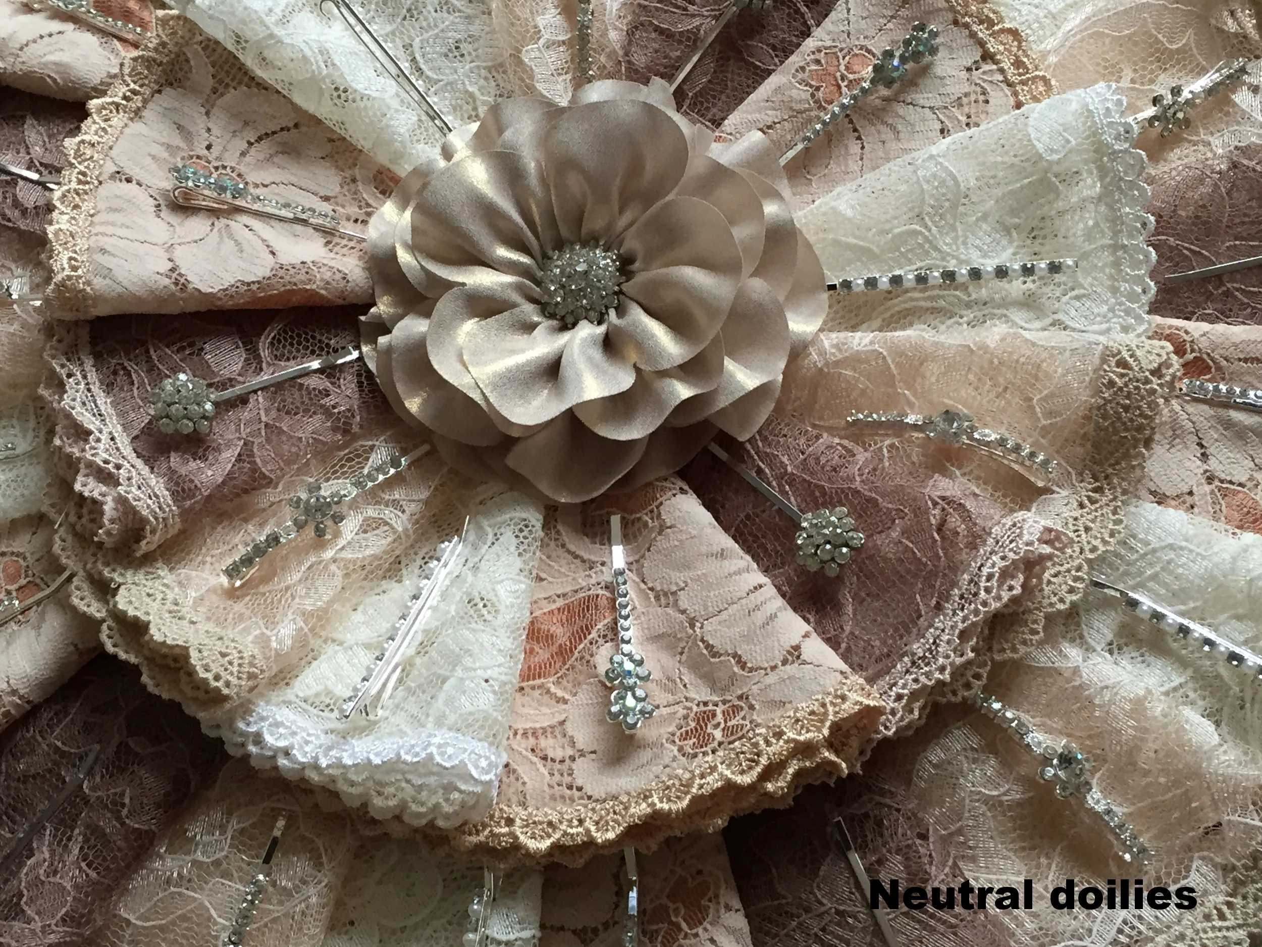Platter of Neutral doilies assembled on a platter.