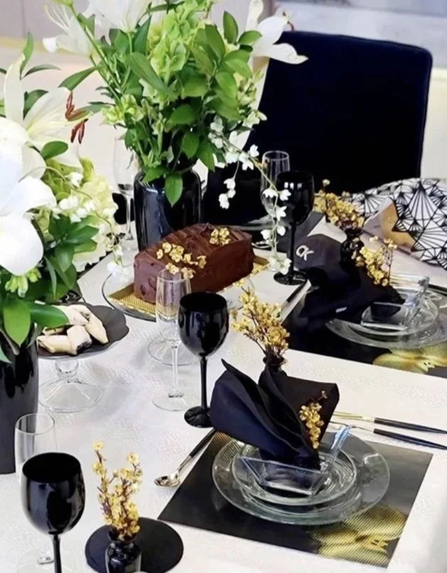 csquared black and gold orchids second tablescape.jpg