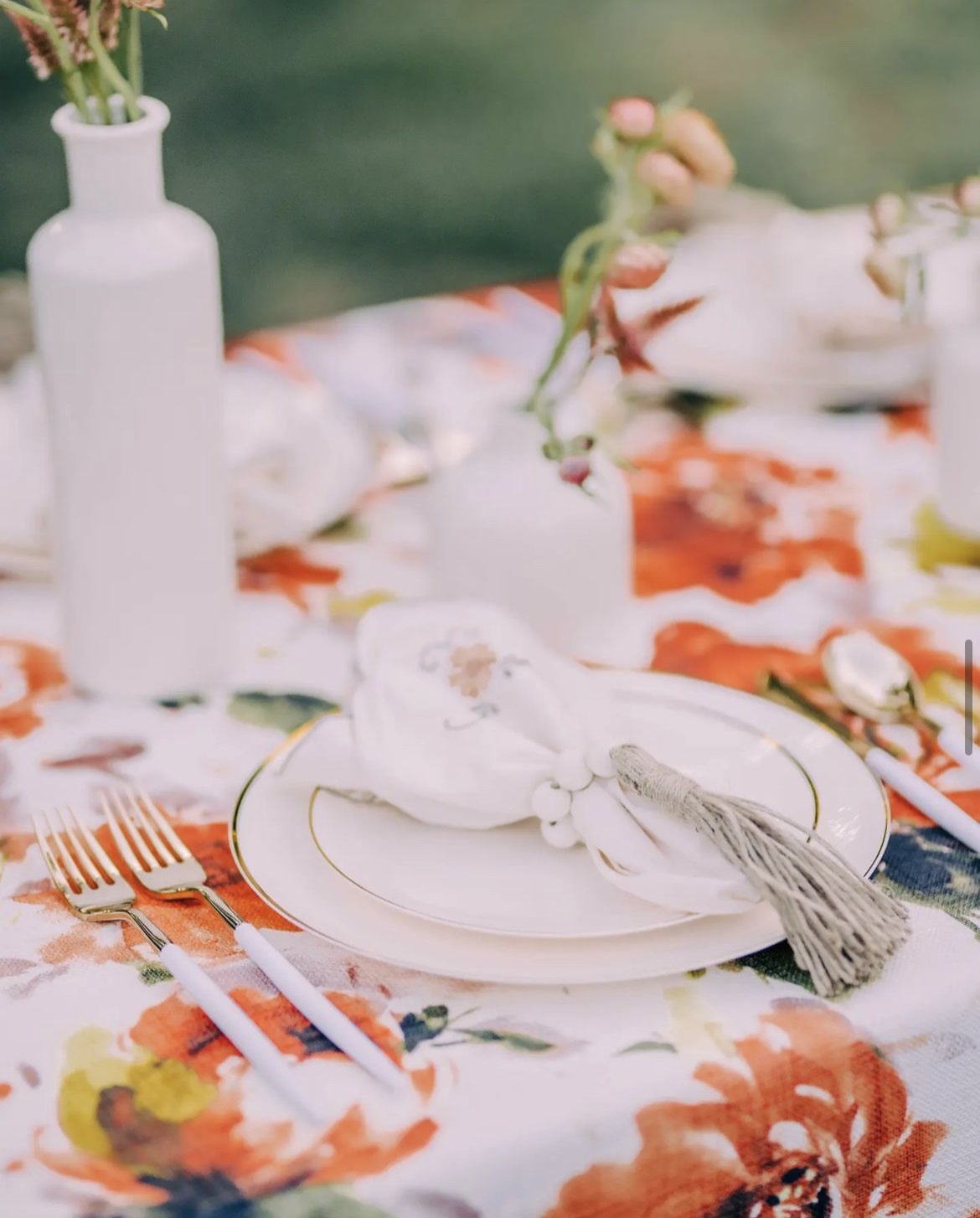 tablecloth orange and yellow floral tablescape.jpg