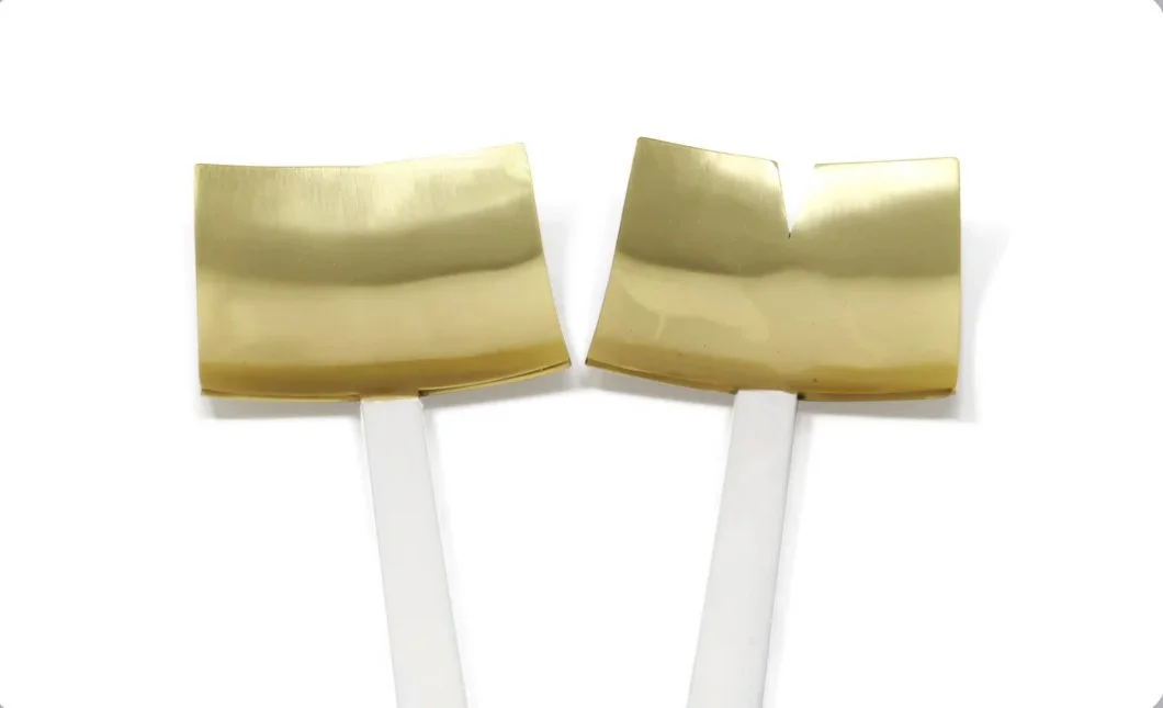 white and gold servers closeup.jpg