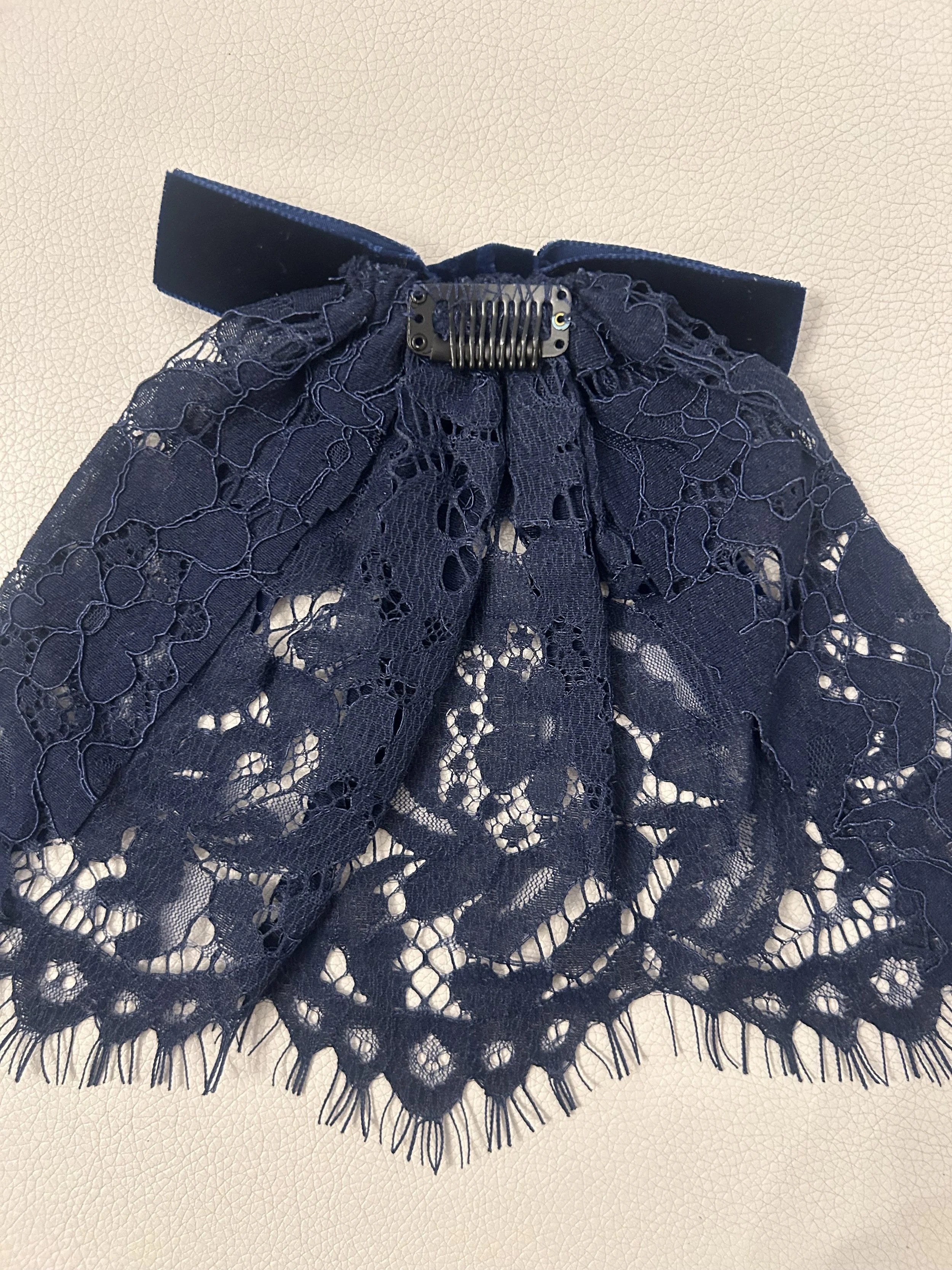 lev coutoure navy cape with velvet bow back.jpg
