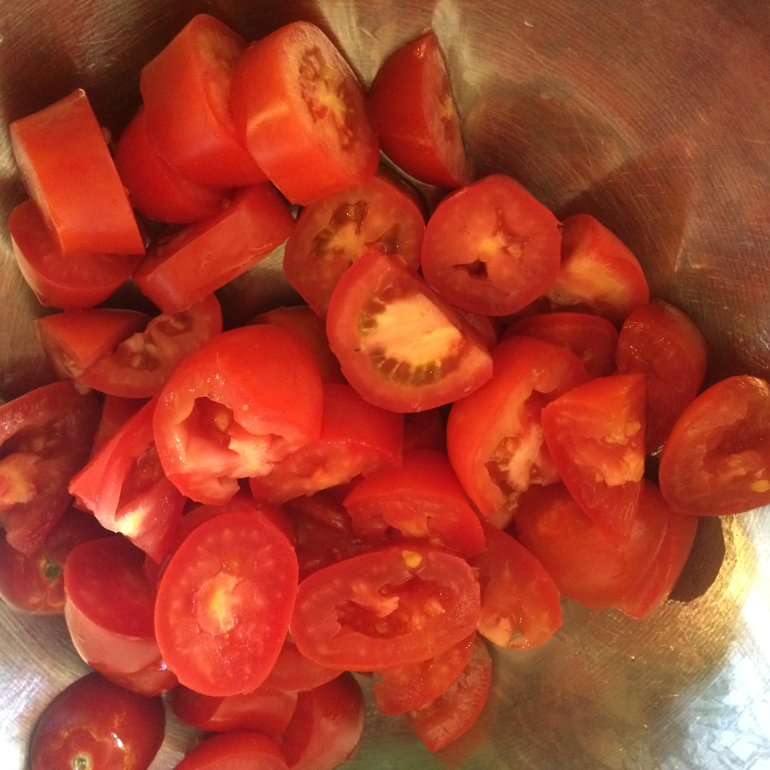 Rough chop the plum or Roma tomatoes and set aside.