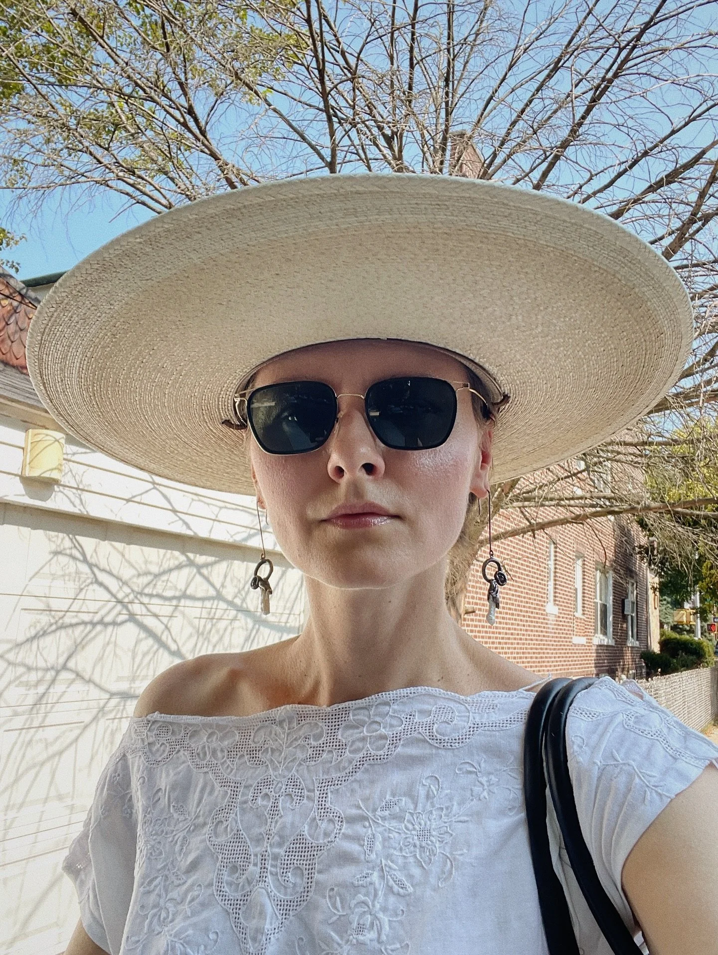 A couple of hours ago,
a young man on a scooter swept me off my feet - 
quite literally.

He came flying out of the tall green bushes at rocket speed.
I was walking on the sidewalk, mid-text,
wearing all white:
my favorite handmade Italian tunic,
sti