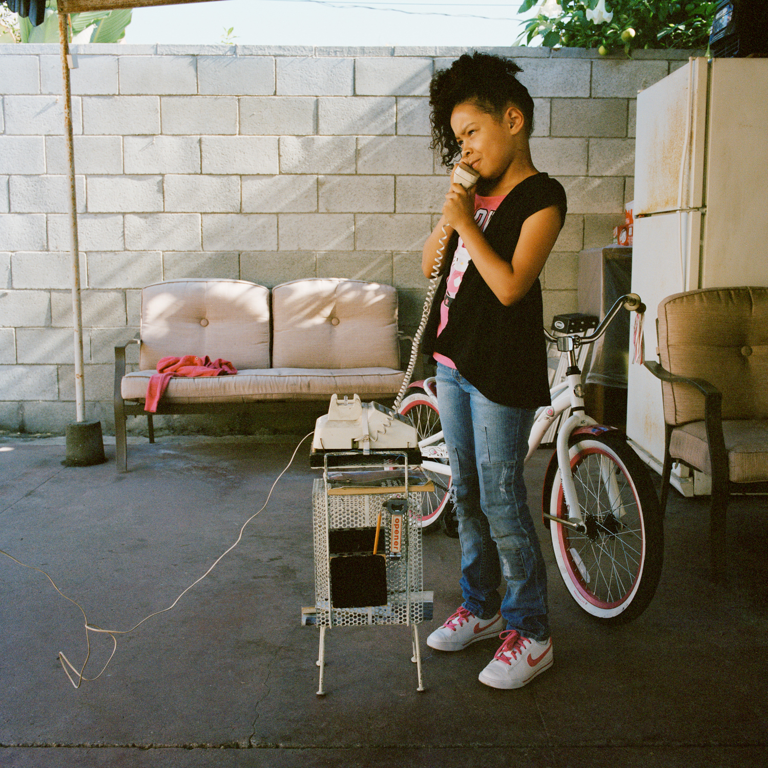   Mia on Chuck's outside phone, Los Angeles  2013 