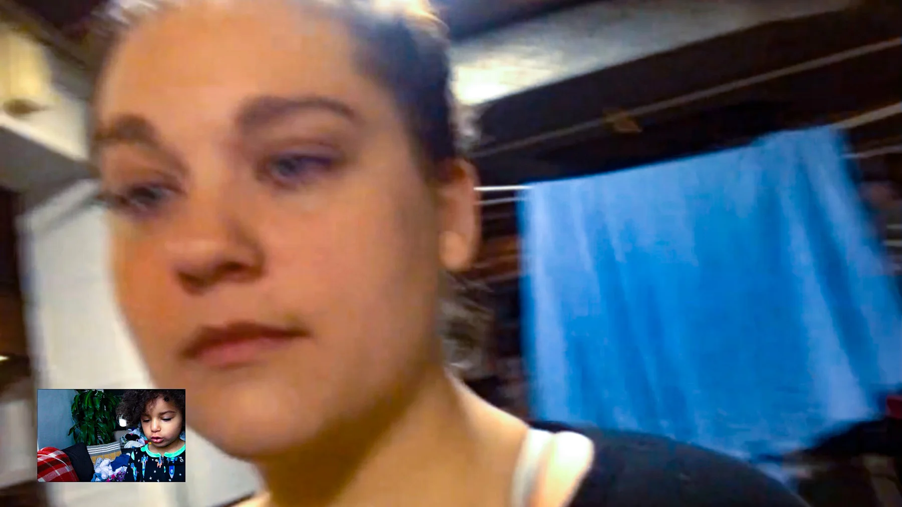 Sarah in the basement showing me her things 2017