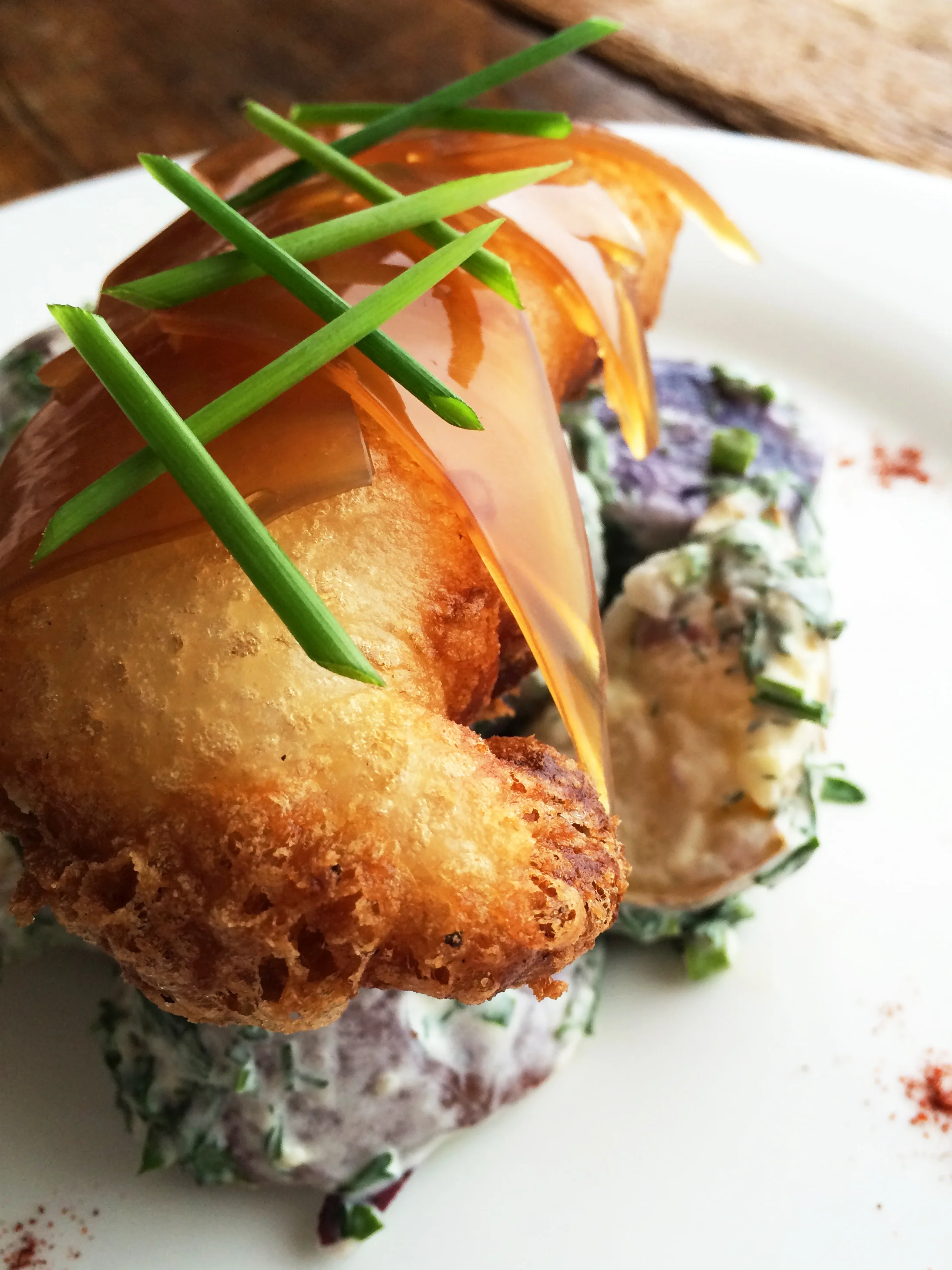 "Fish & Chips", Beer-battered Atlantic Cod, Malt Vinegar Veil, Papas Bravas Salad