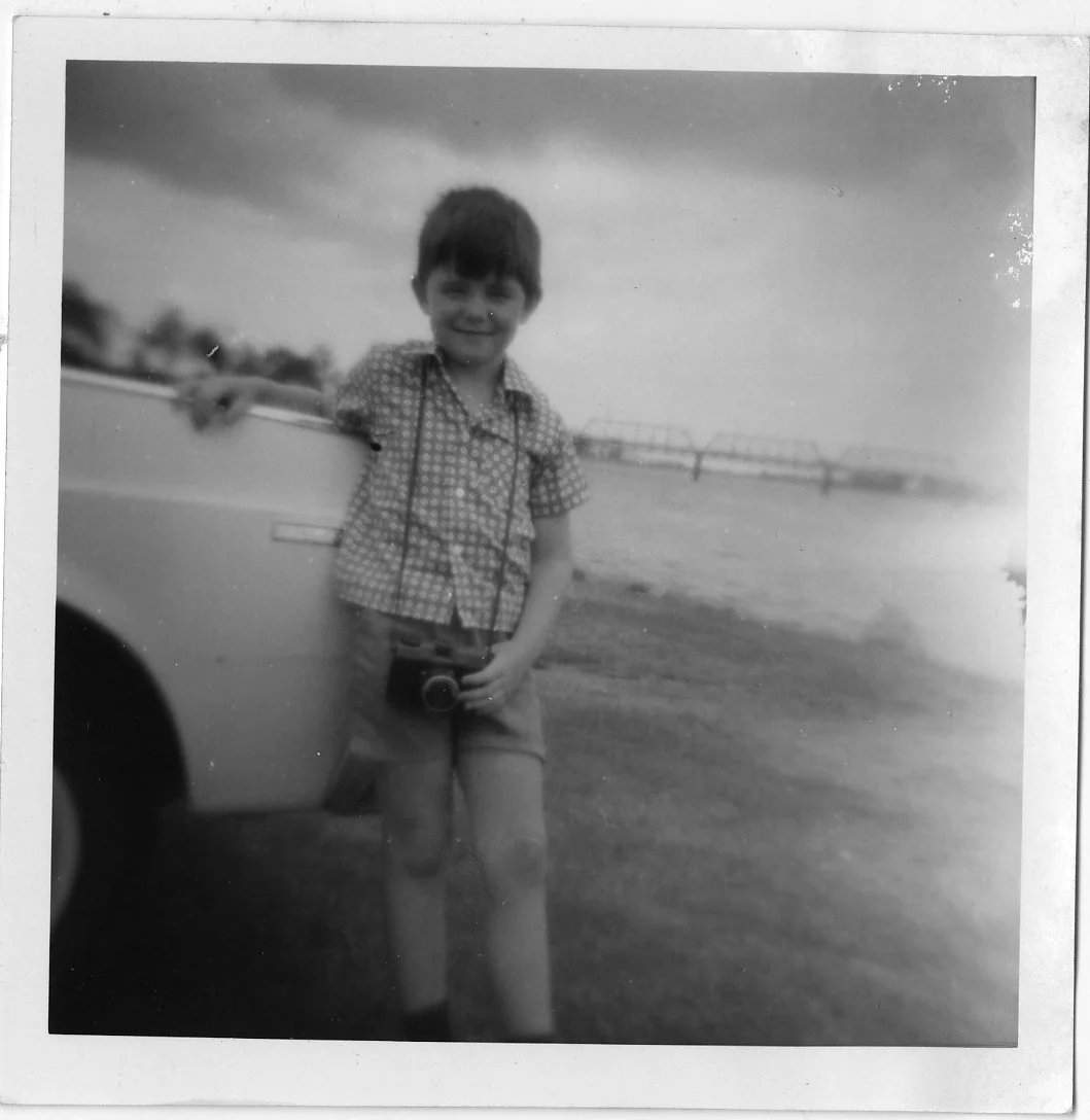 I’ve been interested in photography for quite a long time – check out this photo of me when I was quite young with a camera around my neck!