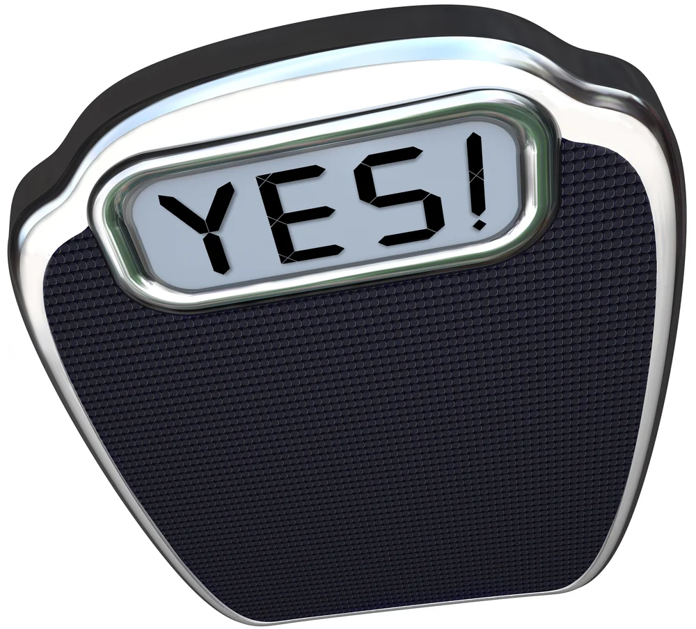 Weighing scales saying yes shutterstock_127148471.jpg