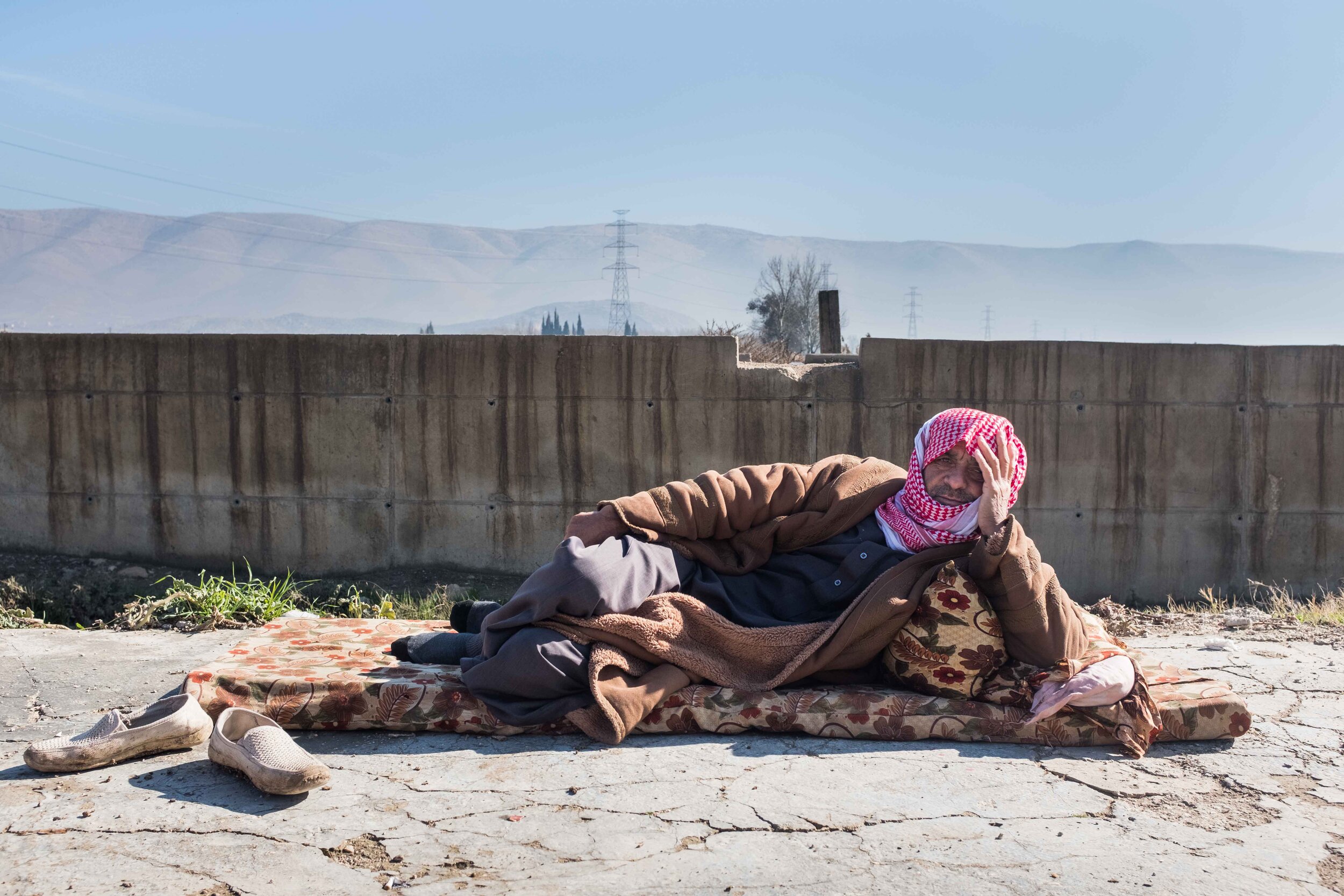  Ahmad has been staying in a camp in the Beqaa Valley, East Lebanon, since 2012. Despite living only about 10 kilometres away from his home country, Syria, and seeing its mountains daily (behind him in the photo), the return perspectives that he face