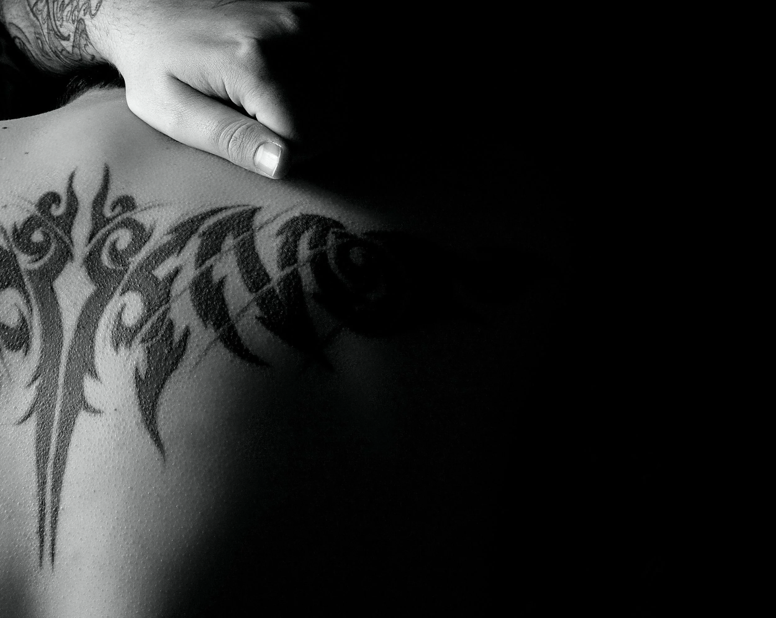 HomePageBackTattoo-2X-MORE-LEFT-CROP.jpg