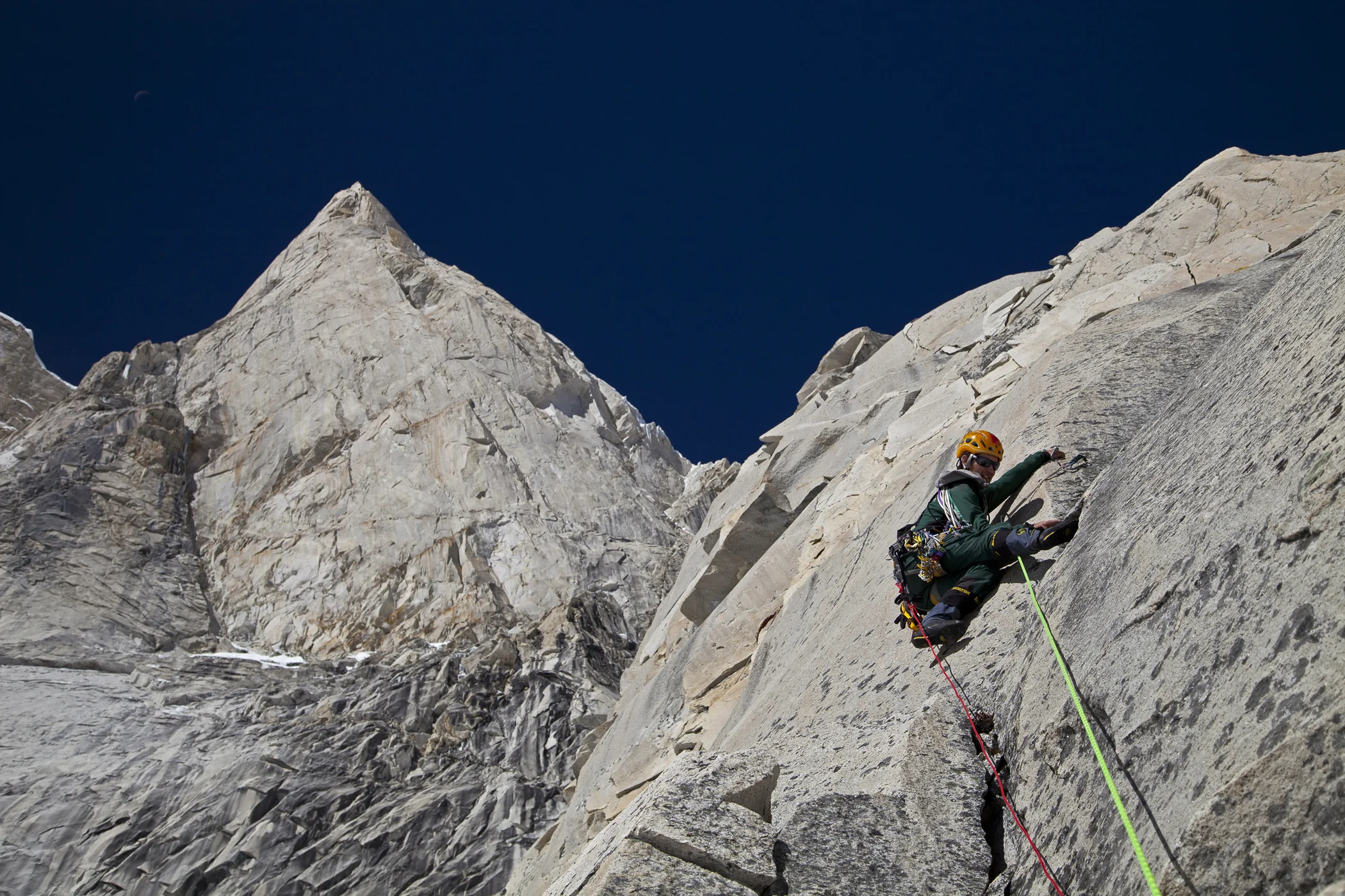 Day 2 of the 2011 Meru Expedition, Renan Ozturk leads pitch 13 of the Shark’s Fin route. This is the first rock pitch on the ridge above the "Funnel."
