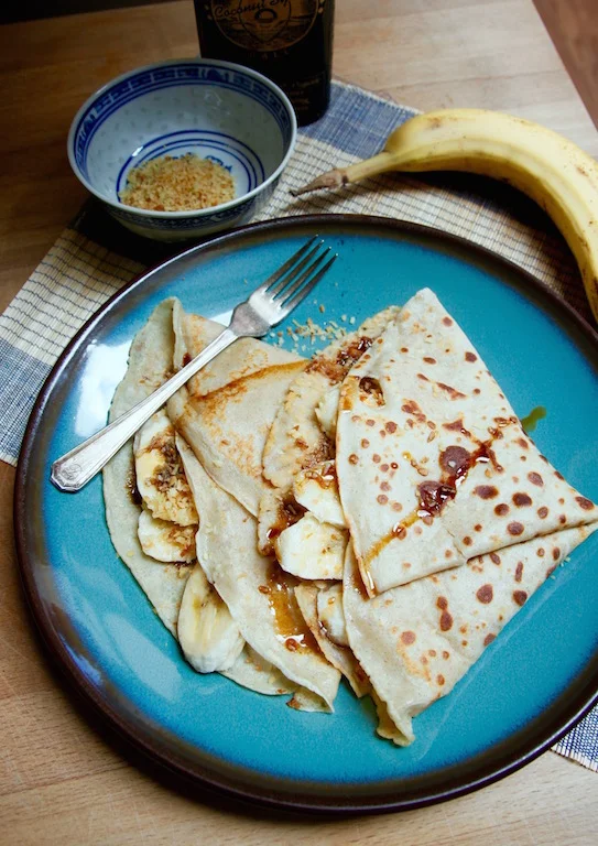 Indonesianstyle banana pancakes with caramelised coconut — Nutmegs, seven