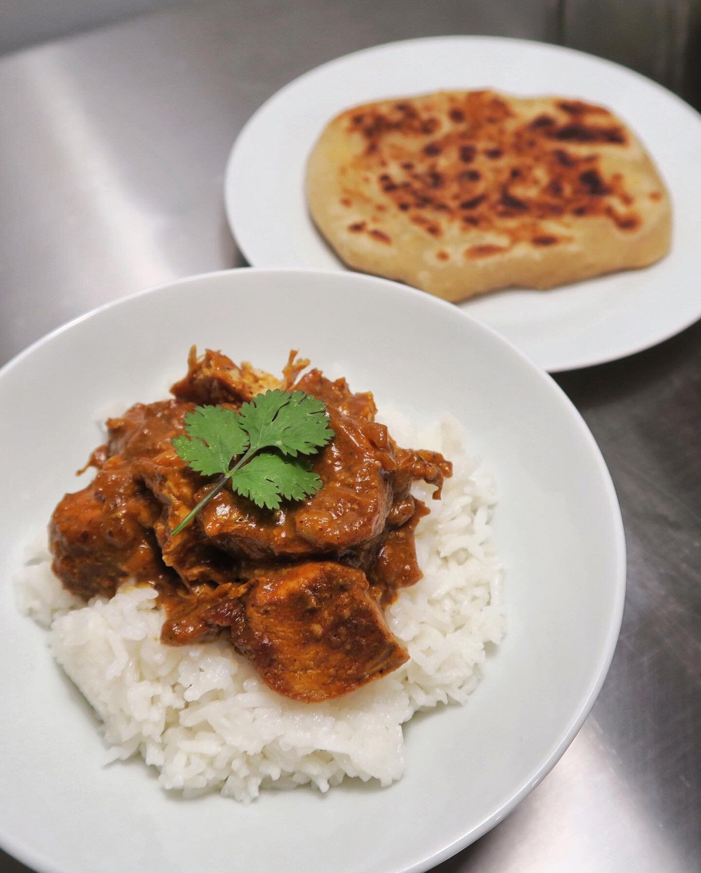 Homemade chicken korma and aloo paratha.