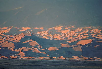 Star Dune, the tallest dune at 750' (229m), and part of the 30 square mile dunefield beyond. NPS/Patrick Myers