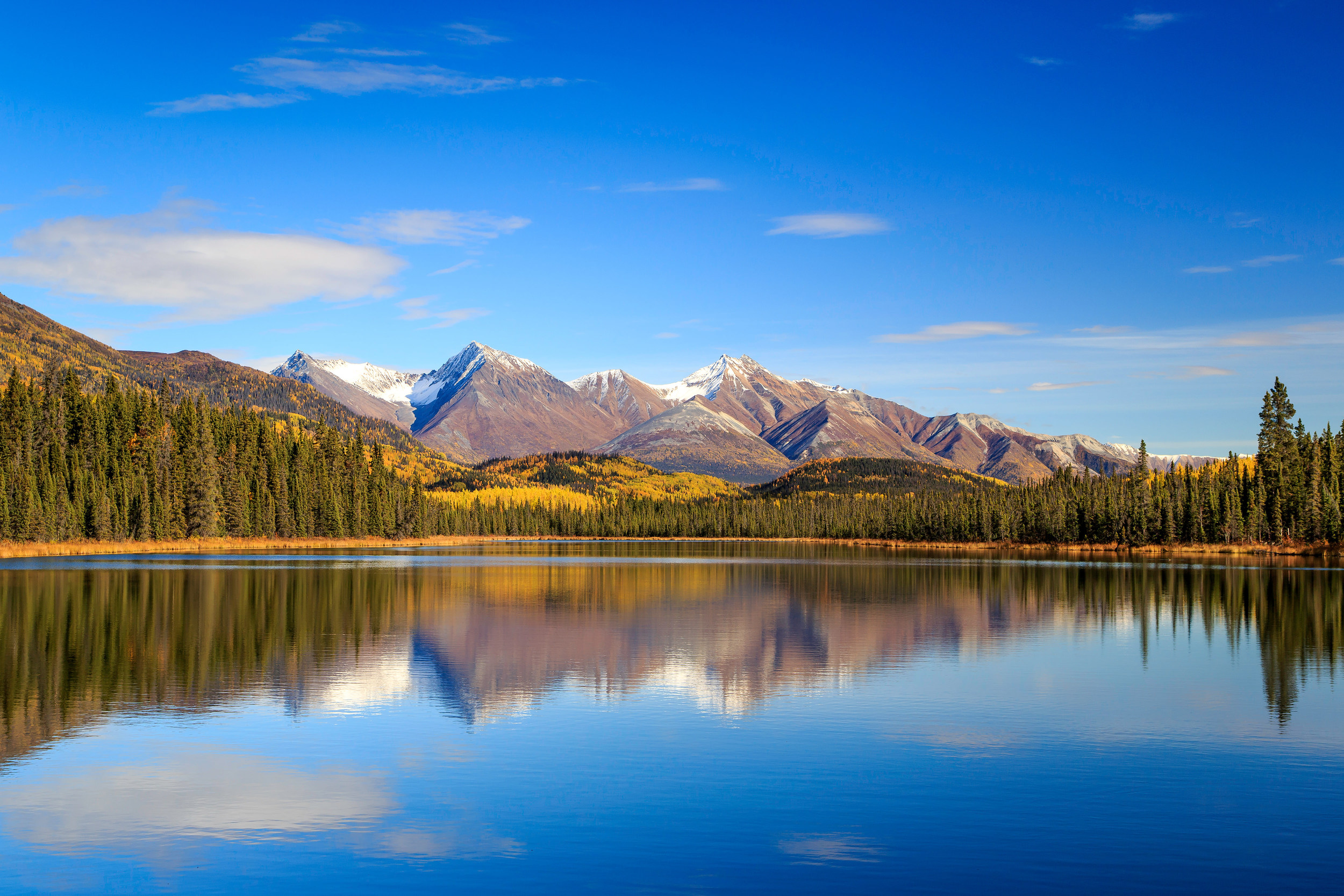 AUTUMN REFLECTION IN WRANGELL-ST. ELIAS - (PHOTO: LONEROC/SHUTTERSTOCK)
