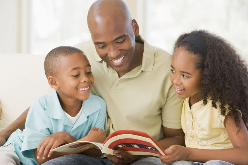 father-and-children-reading.jpg