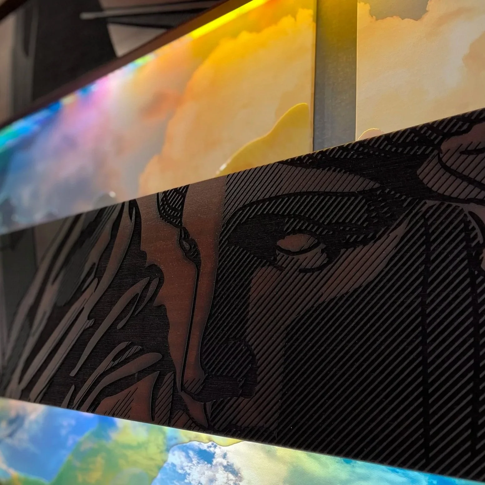 Finished wood panel with laser-engraved artwork and integrated illuminated graphic elements.