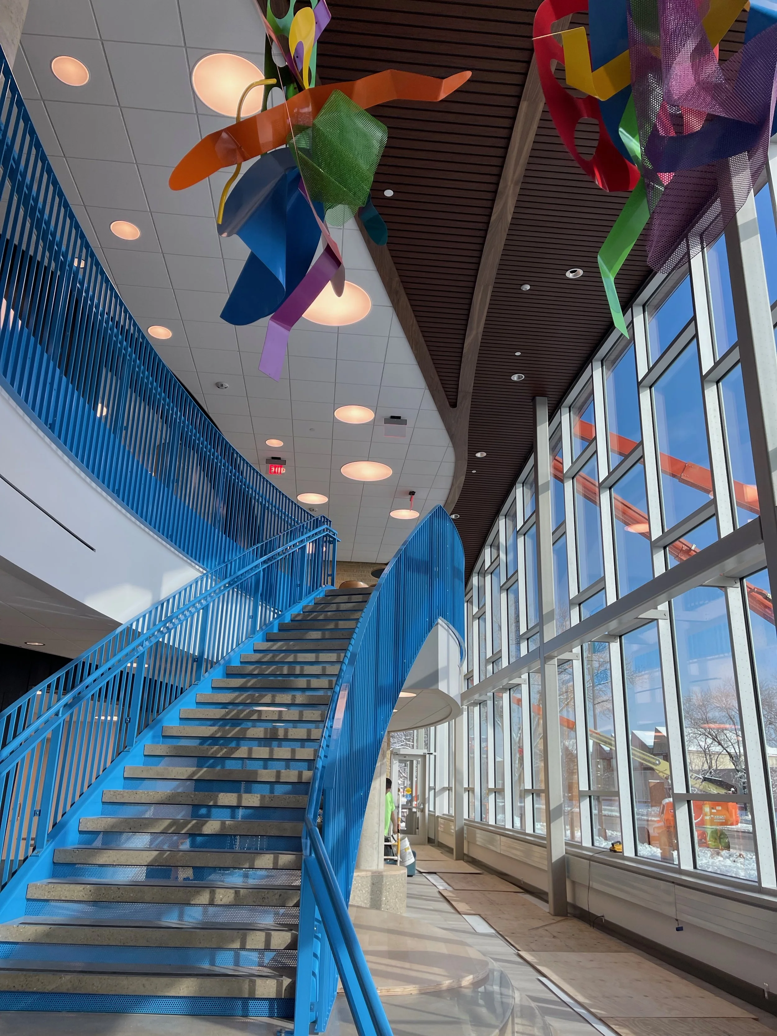 Interior view of the WYSO Center for Music showing architectural features, circulation, and space surrounding the donor recognition installation.