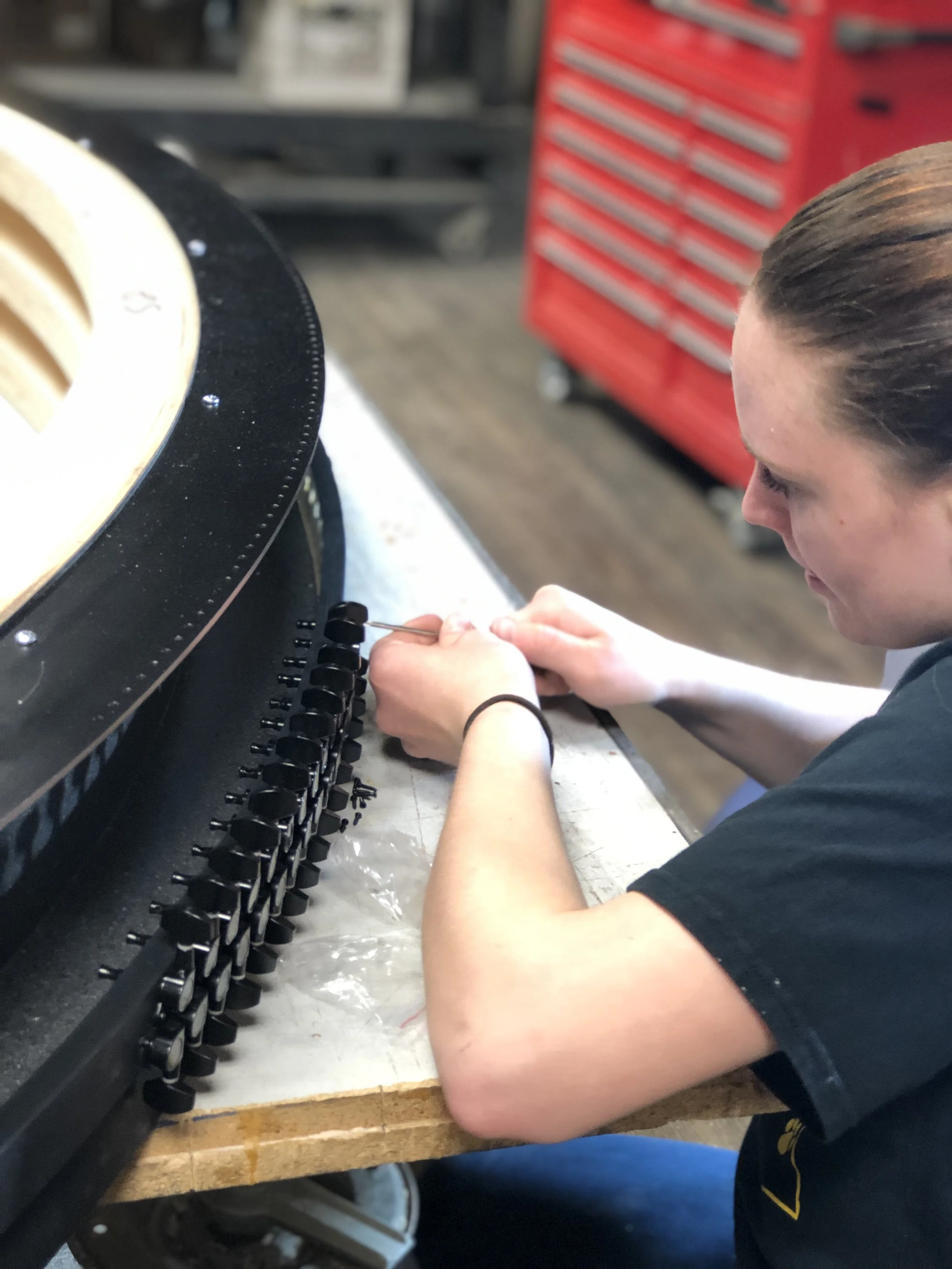 Spolar Studio fabricator completing precise hand assembly on a detailed custom component.